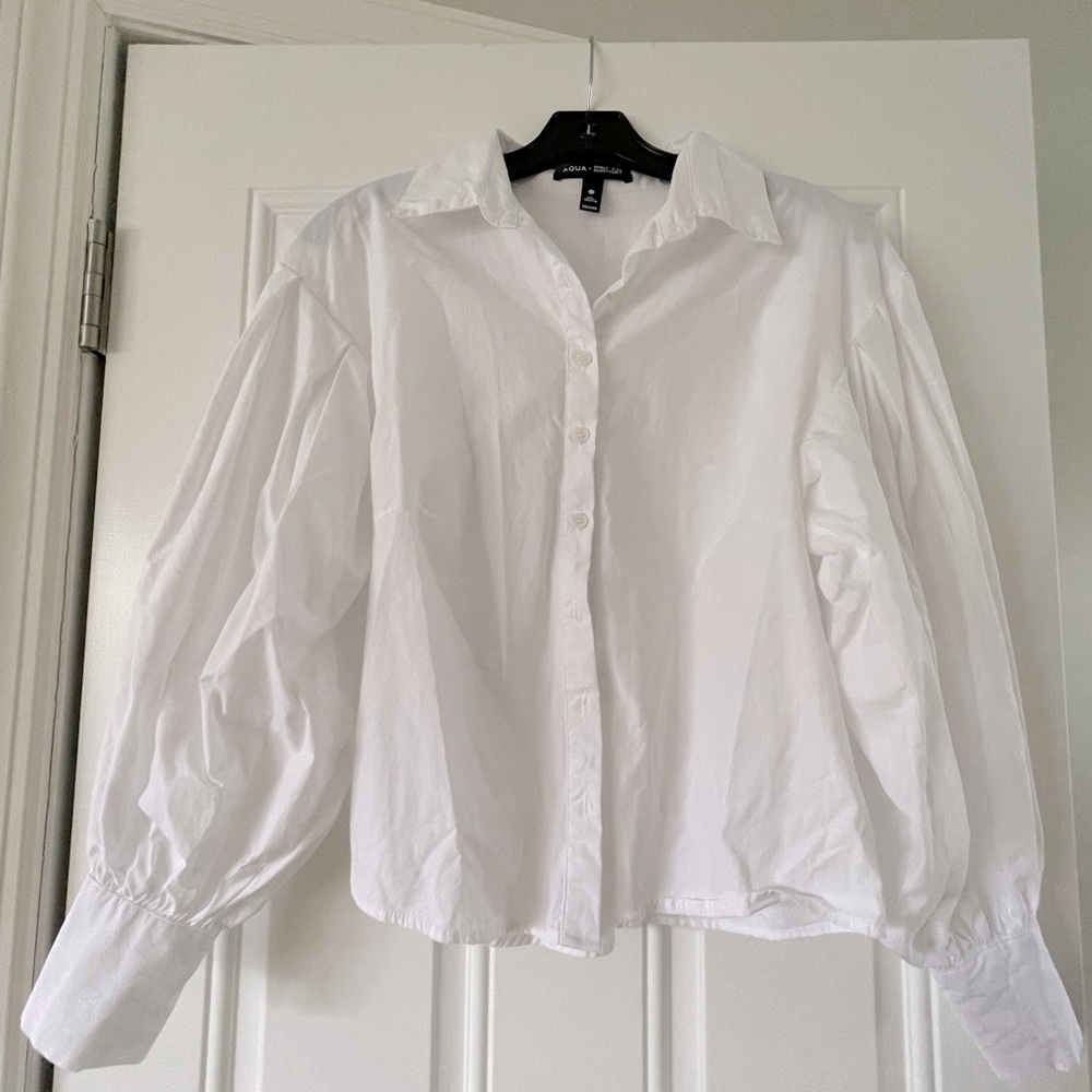 White button down with ballon sleeves. Great condition.